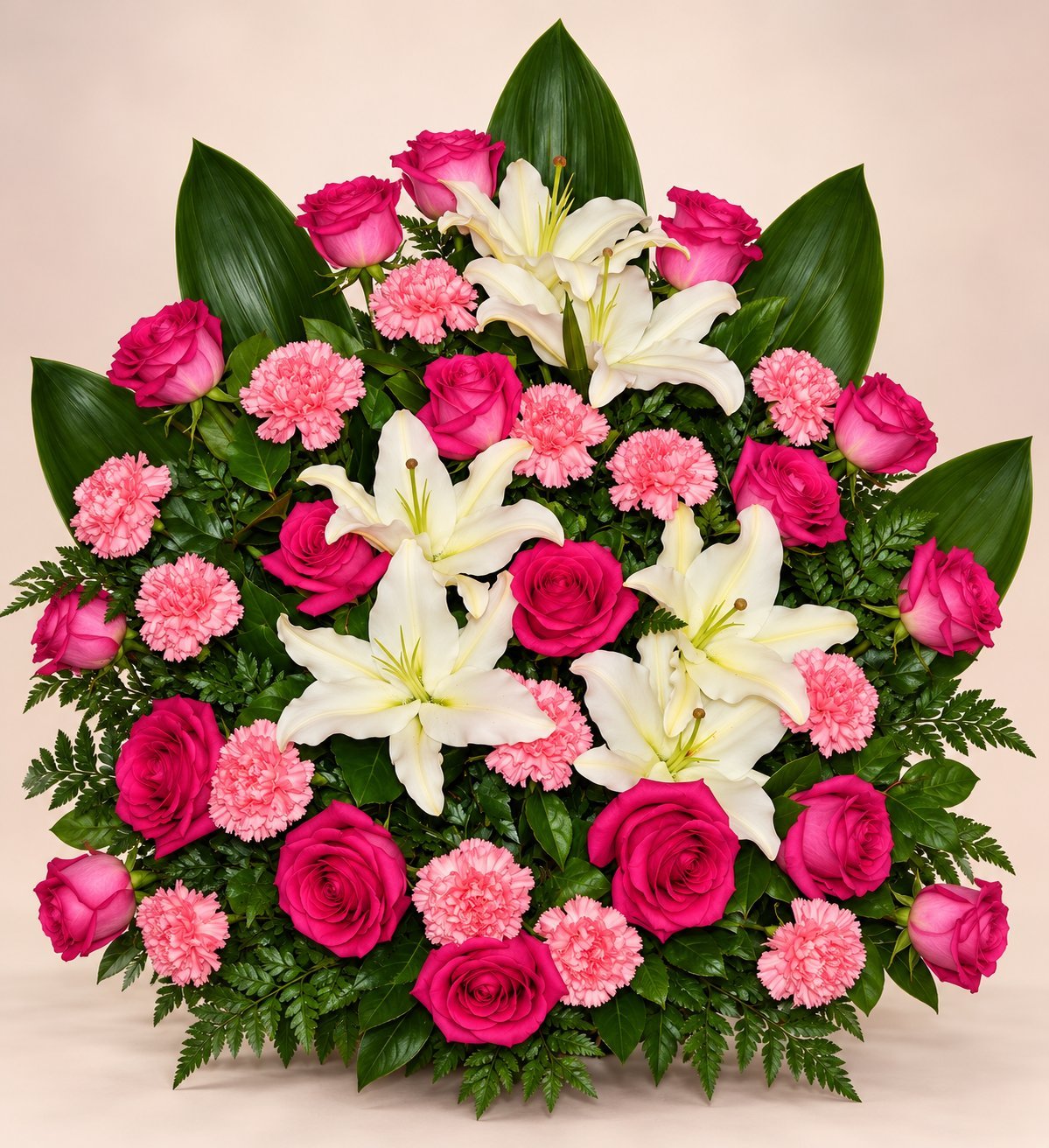 Vibrant floral arrangement with hot pink roses, light pink carnations, white lilies, and green foliage on beige background